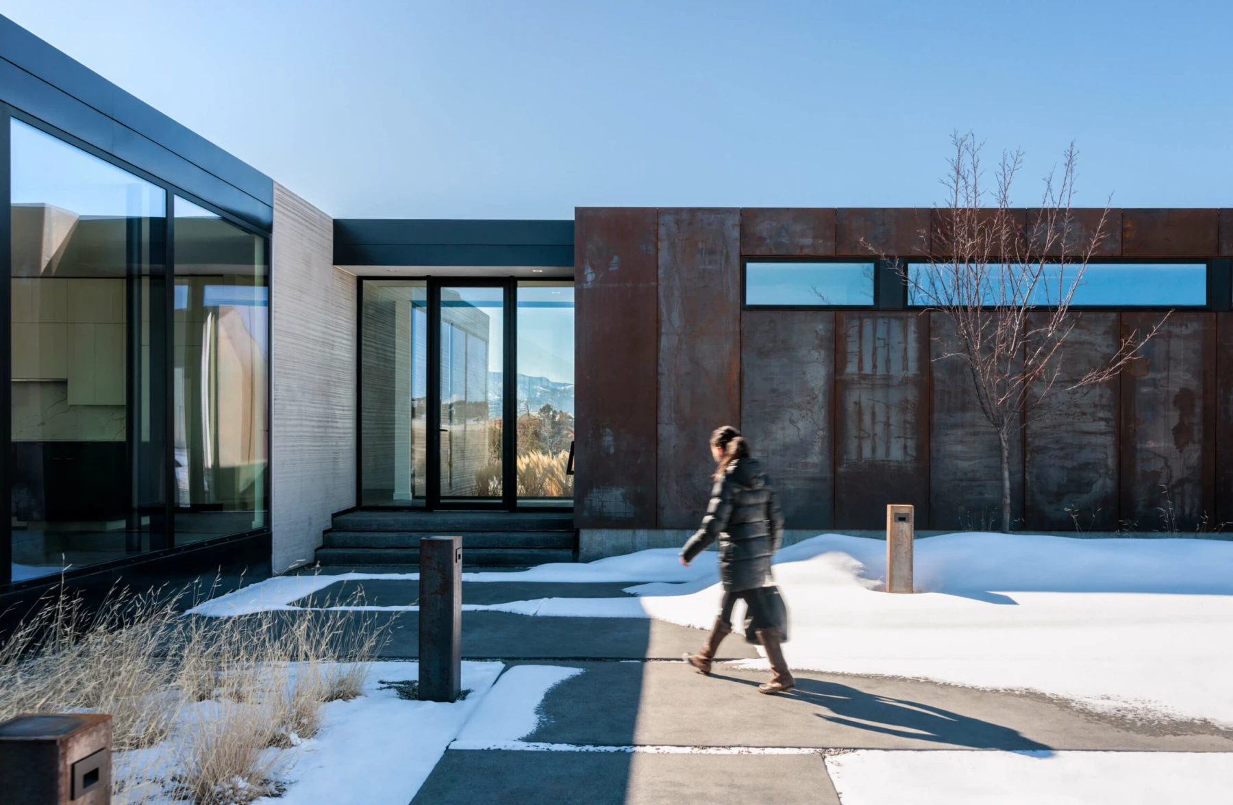 Woman walking in courtyard